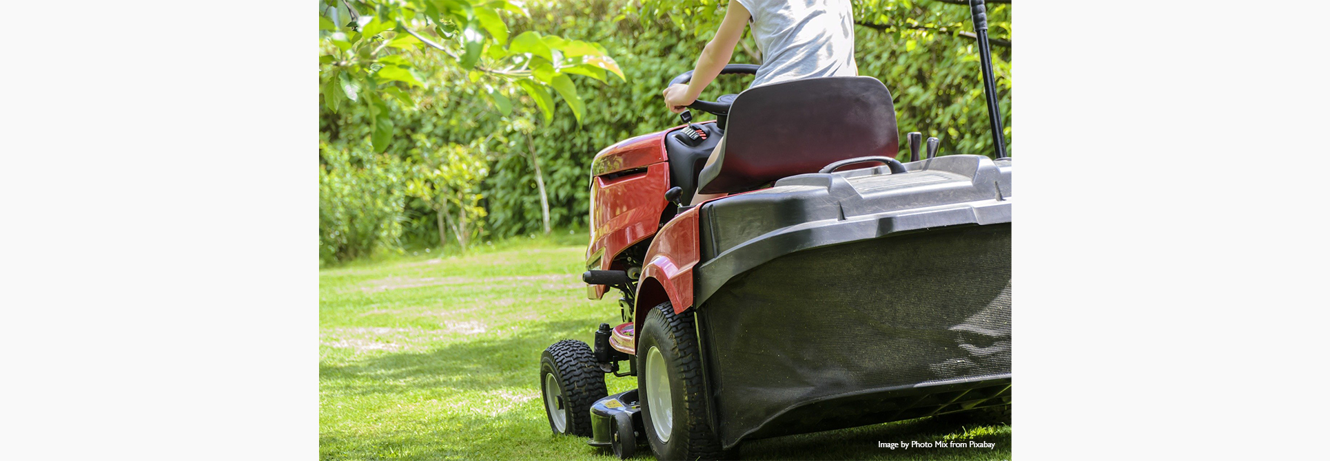 Mowing the lawn on a riding mower