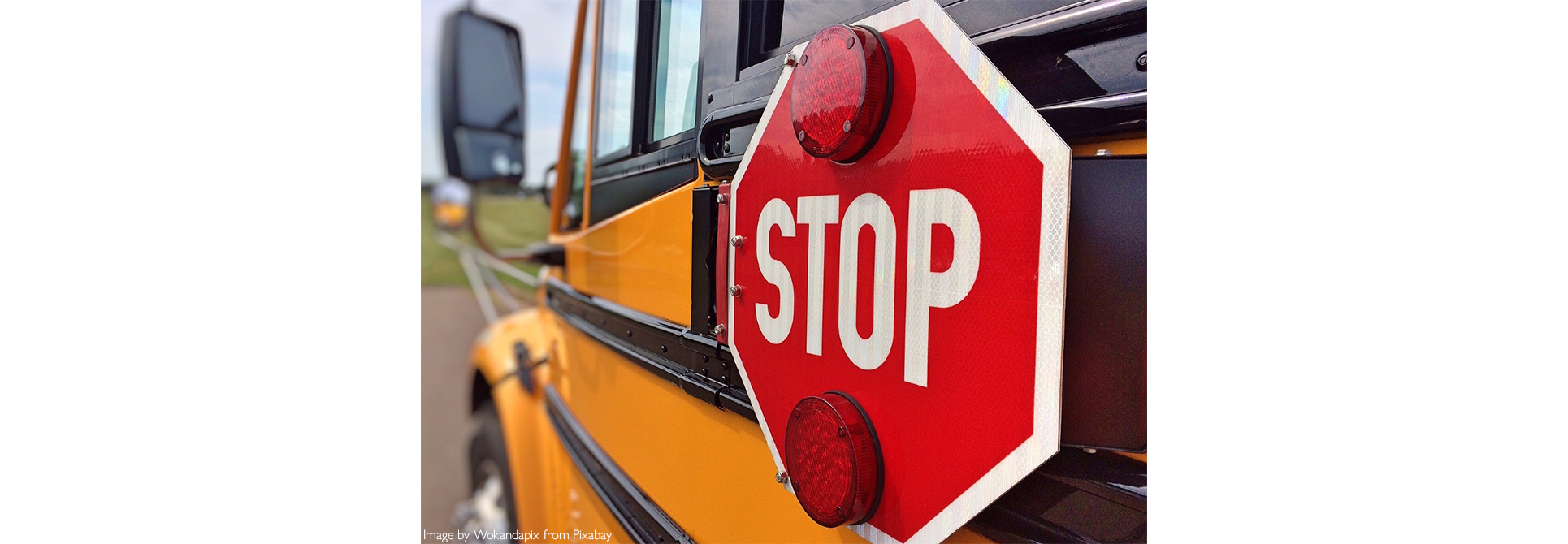 school bus with stop sign
