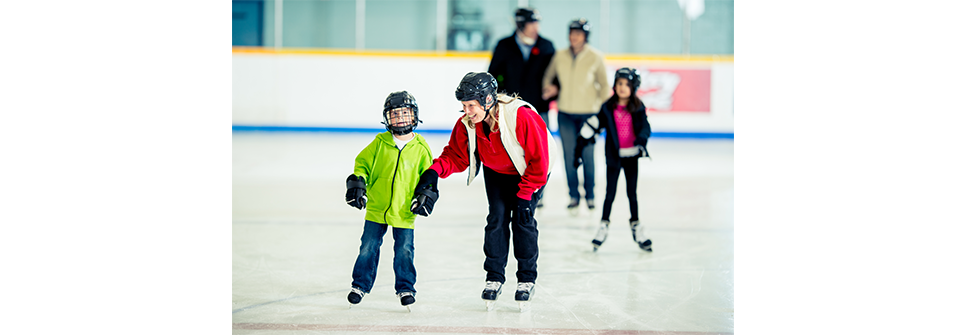 Family Ice Skating at an Arena