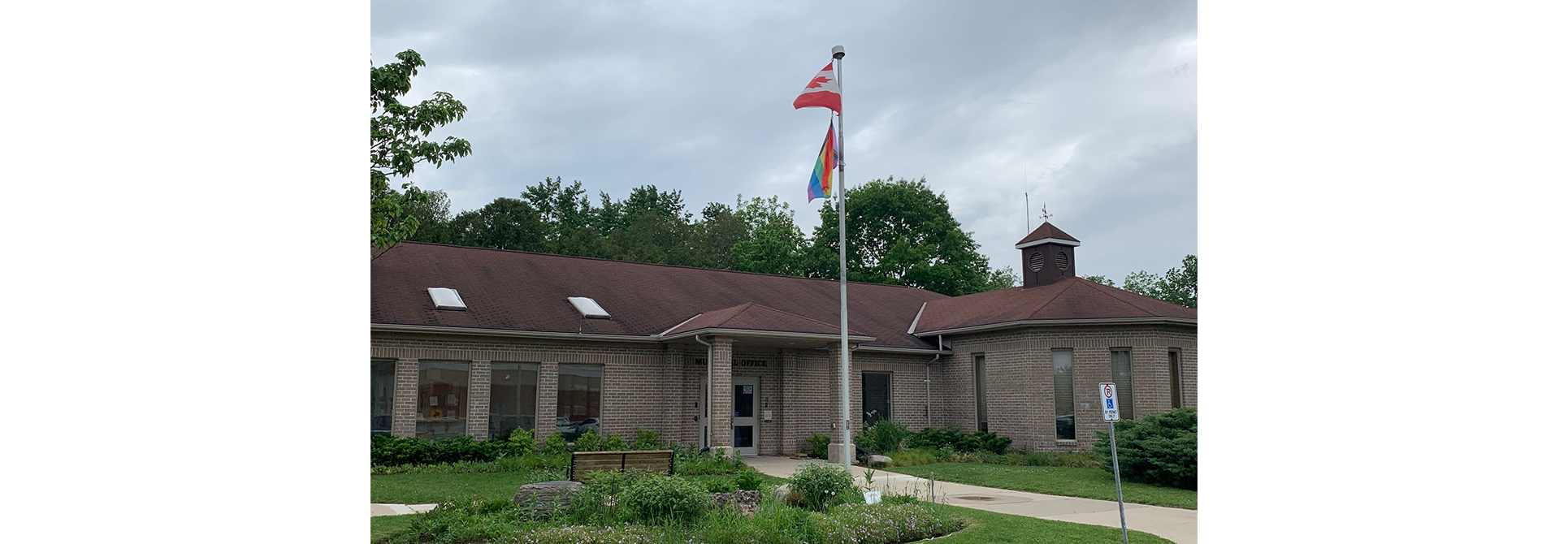 Pride flag in front of Middlesex Centre municipal office