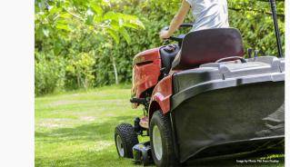 Mowing the lawn on a riding mower