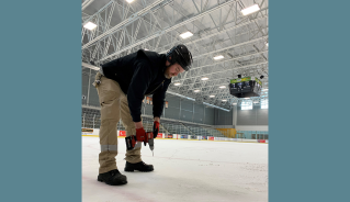 Middlesex Centre staff measure the ice thickness at Komoka Wellness Centre arenas