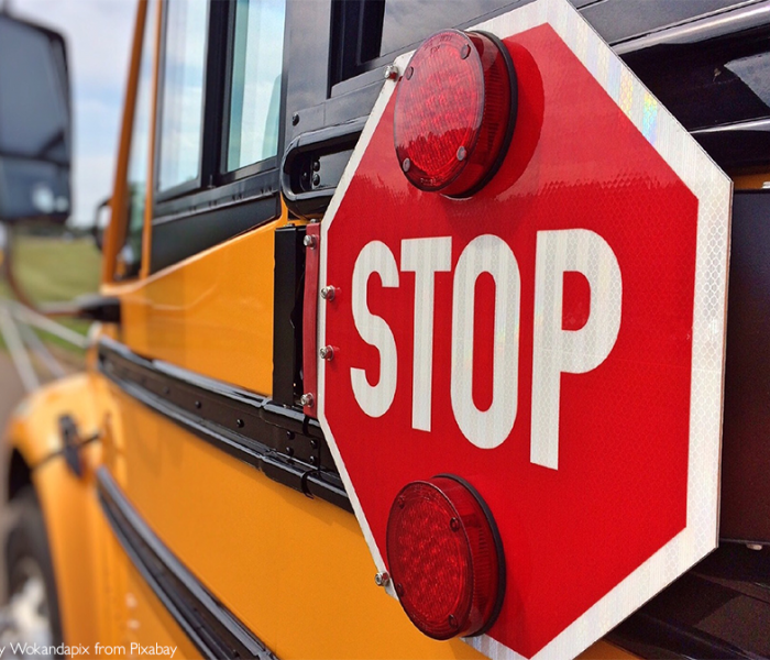 school bus with stop sign