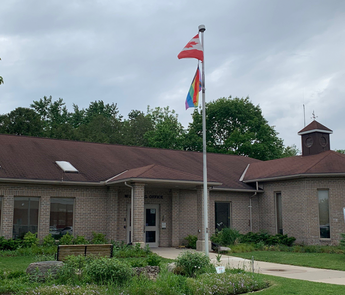 Pride flag in front of Middlesex Centre municipal office